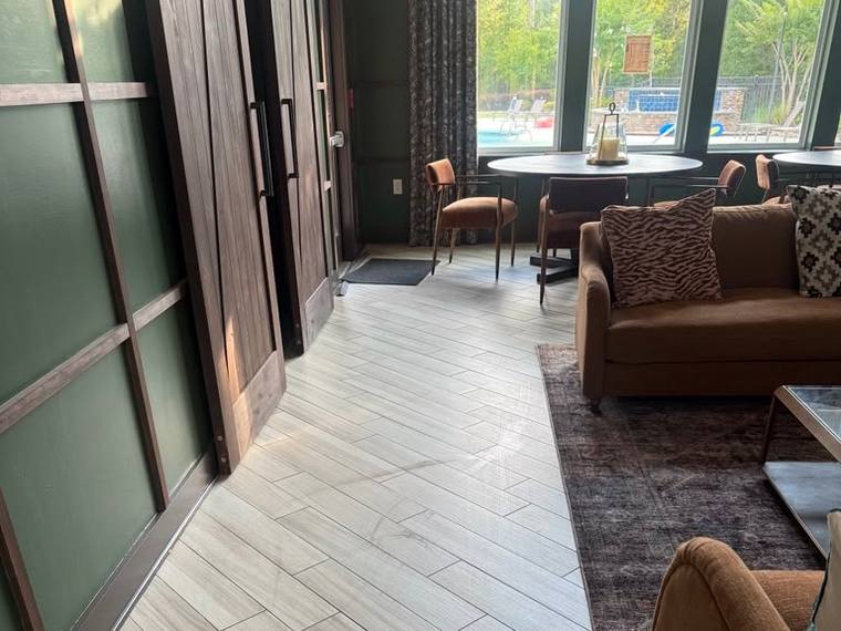 Clean office lounge with polished floors and seating area